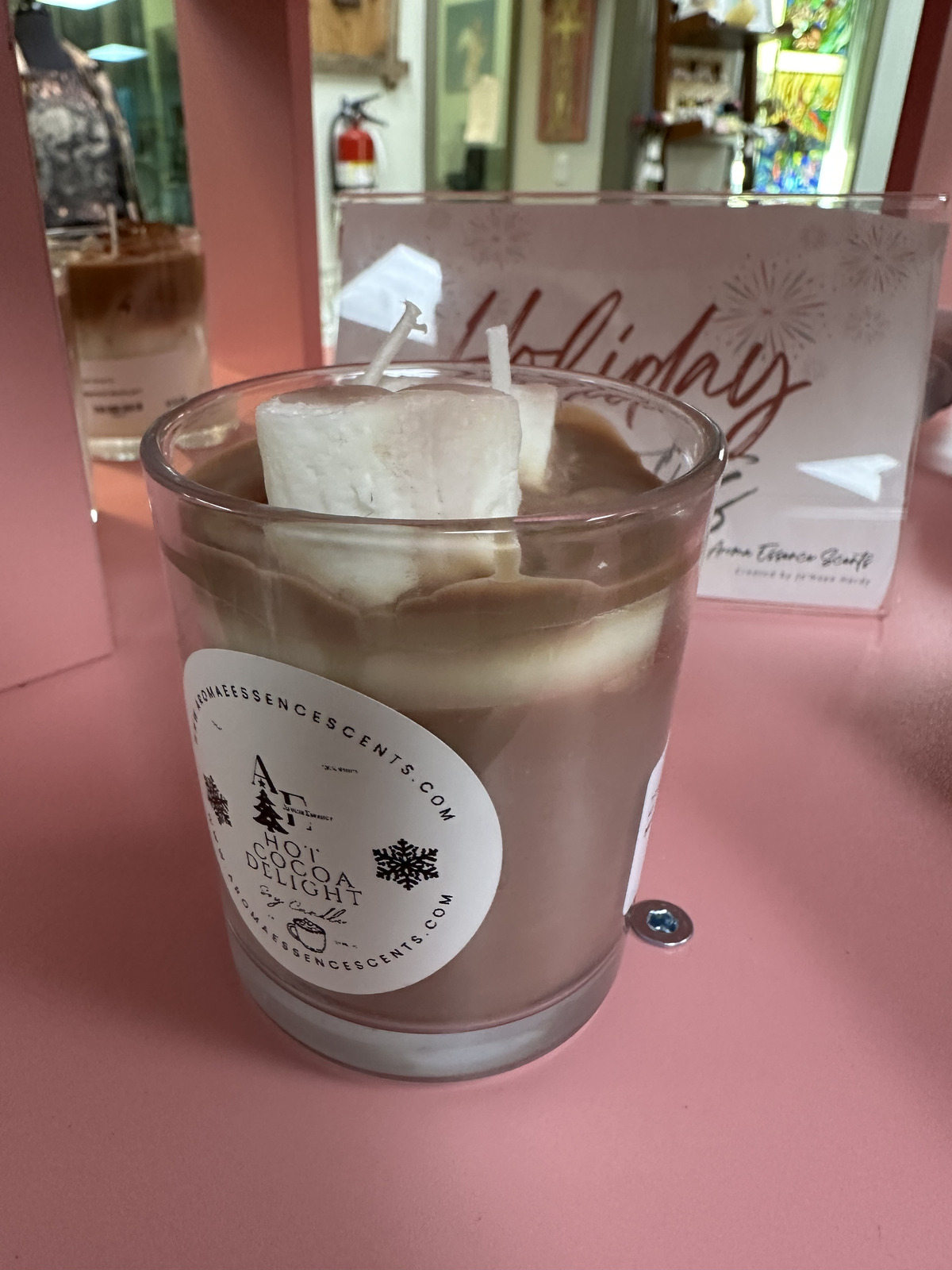 Aroma Essence candle in glass container