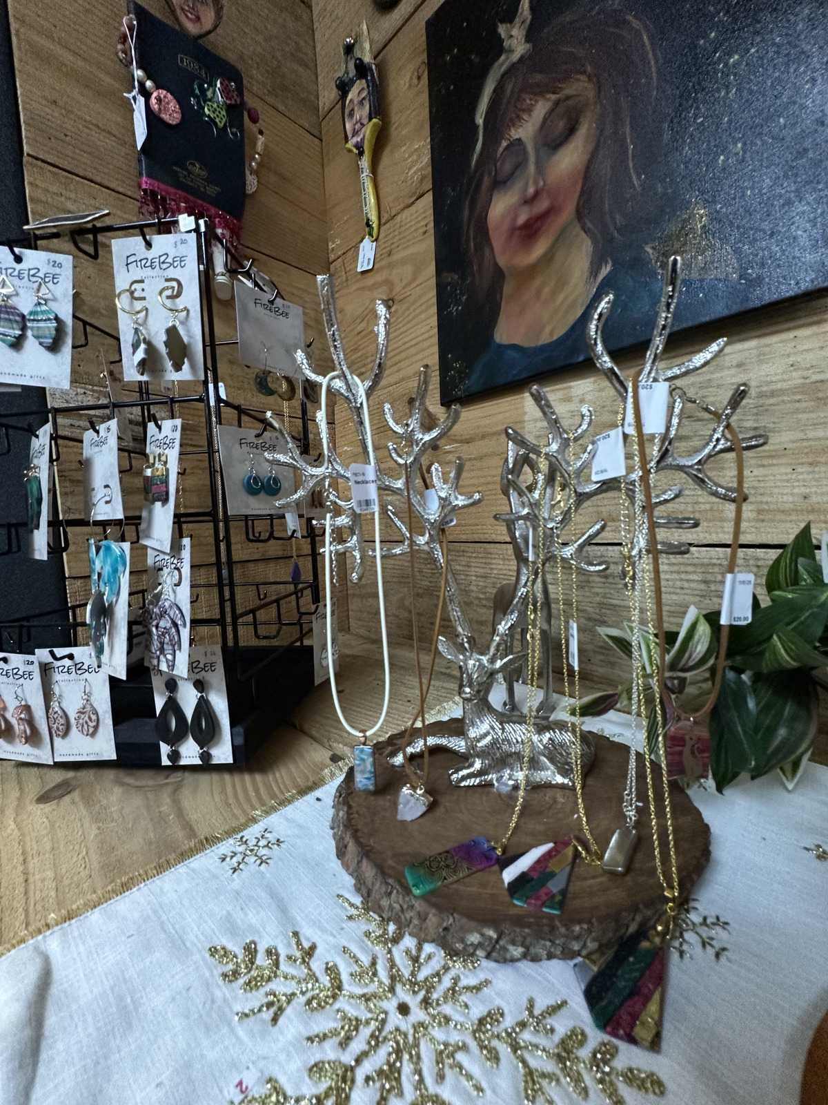 Fire Bee Collection jewelry and display stand inside Triangle Trading Post