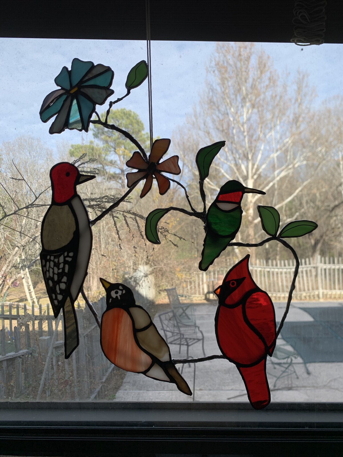 Stained glass bird panel from June Moon at Triangle Trading Post