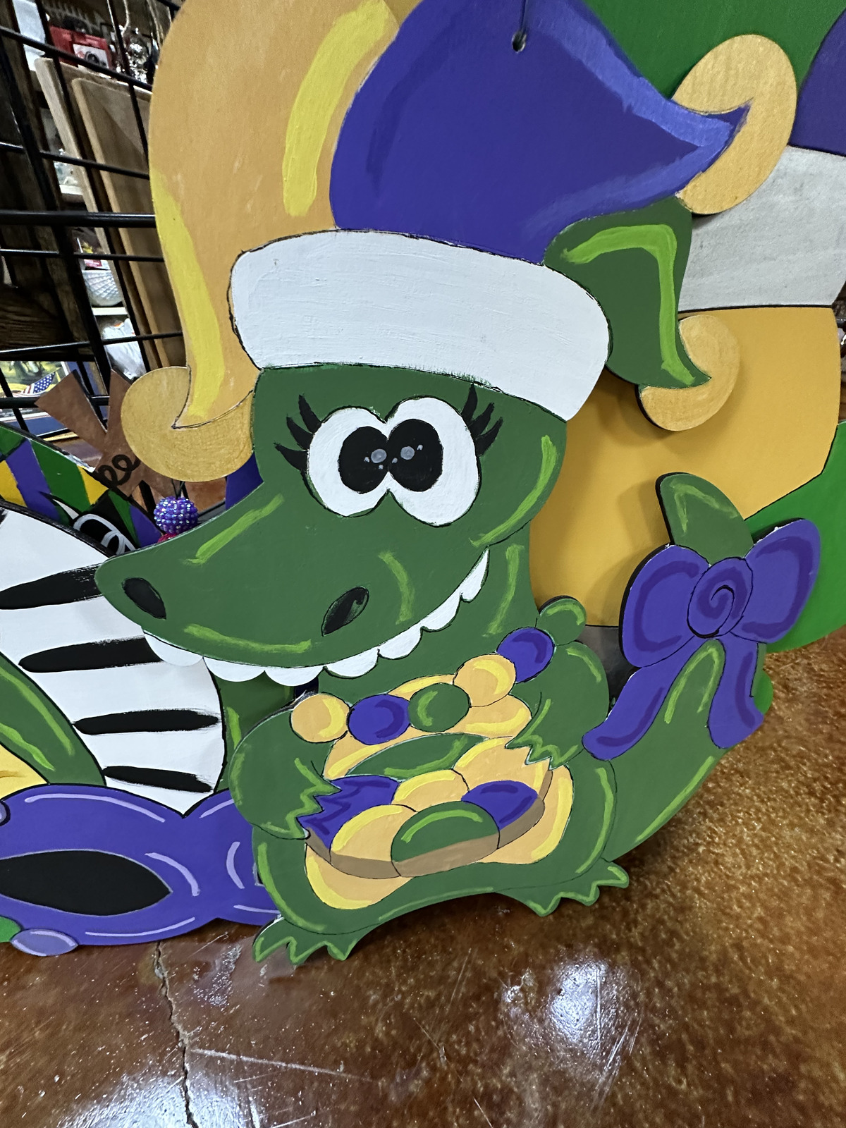 Painted alligator-themed decor from Lolli's Shop