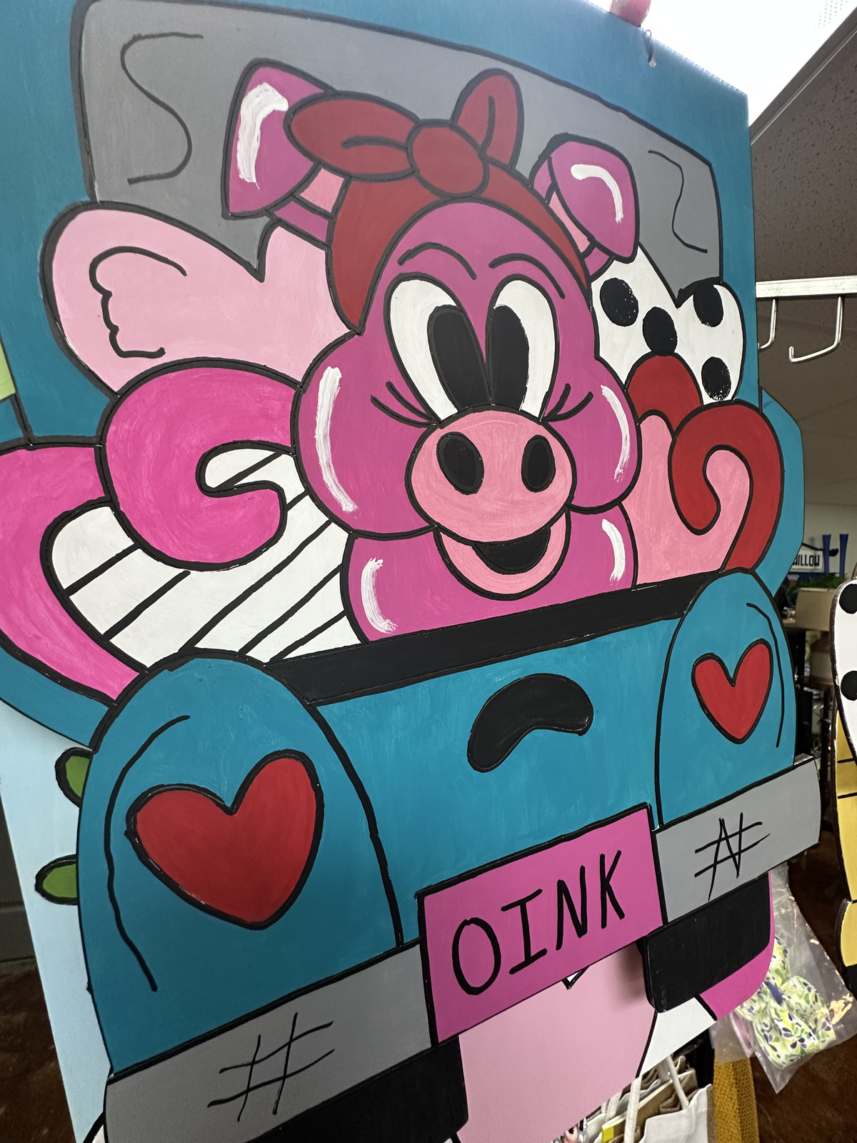 Colorful pig-themed decor from Lolli's Shop