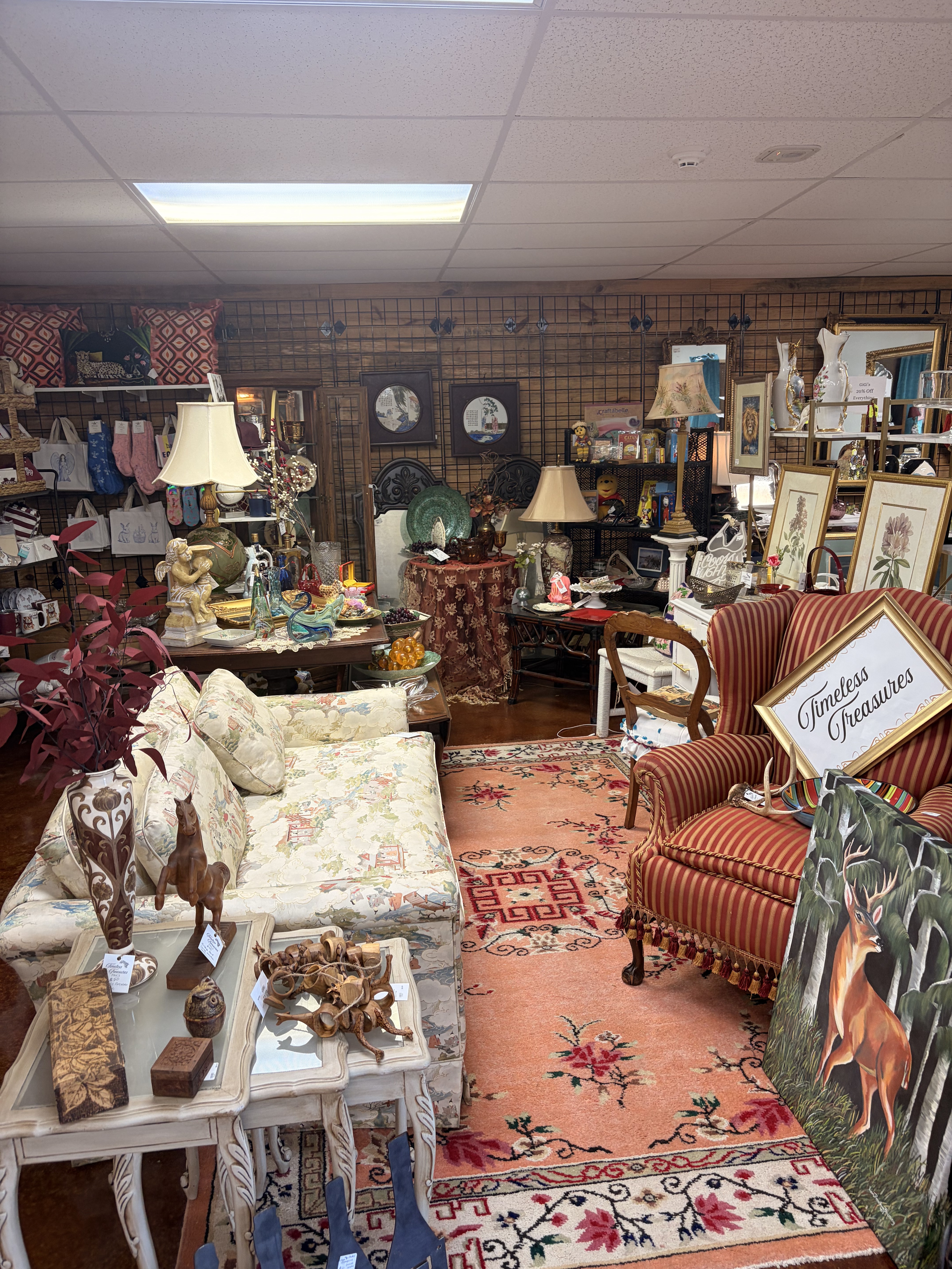 Antique booth with furniture and decor inside Triangle Trading Post