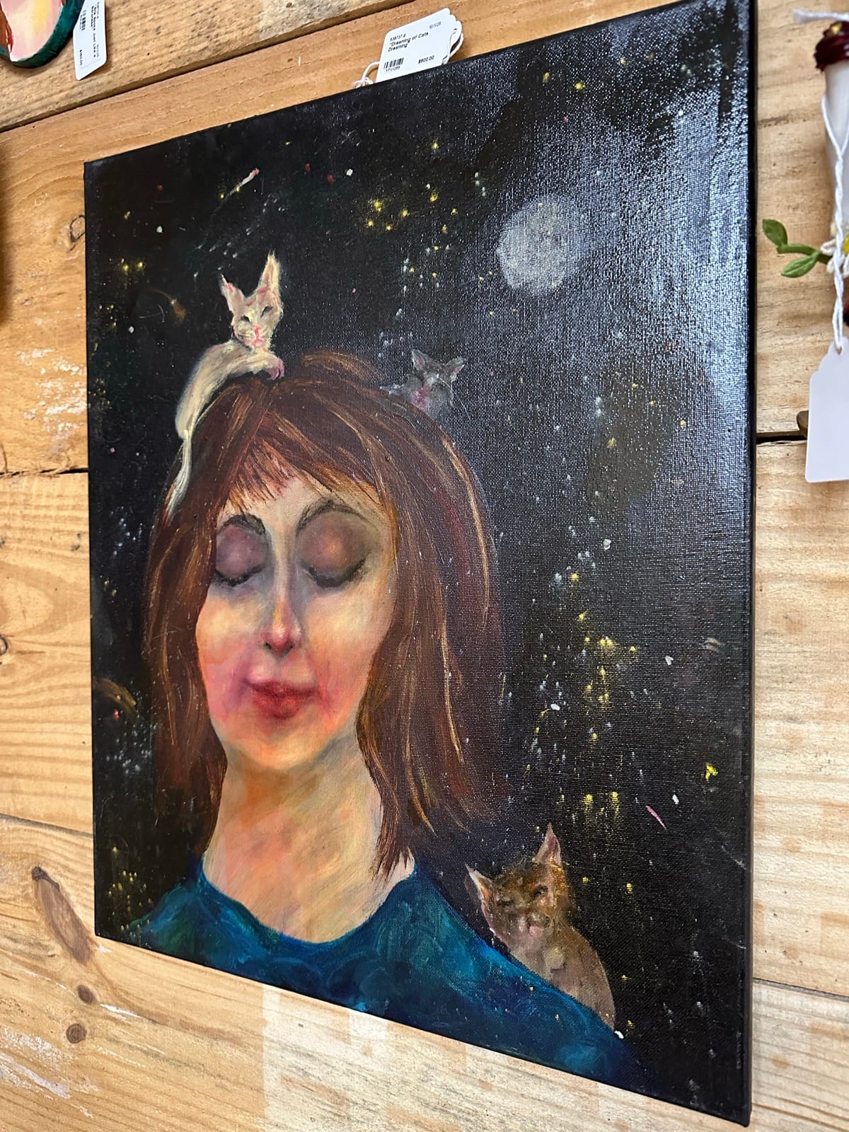 Oil portrait of a woman against a night sky by Adele Elliott