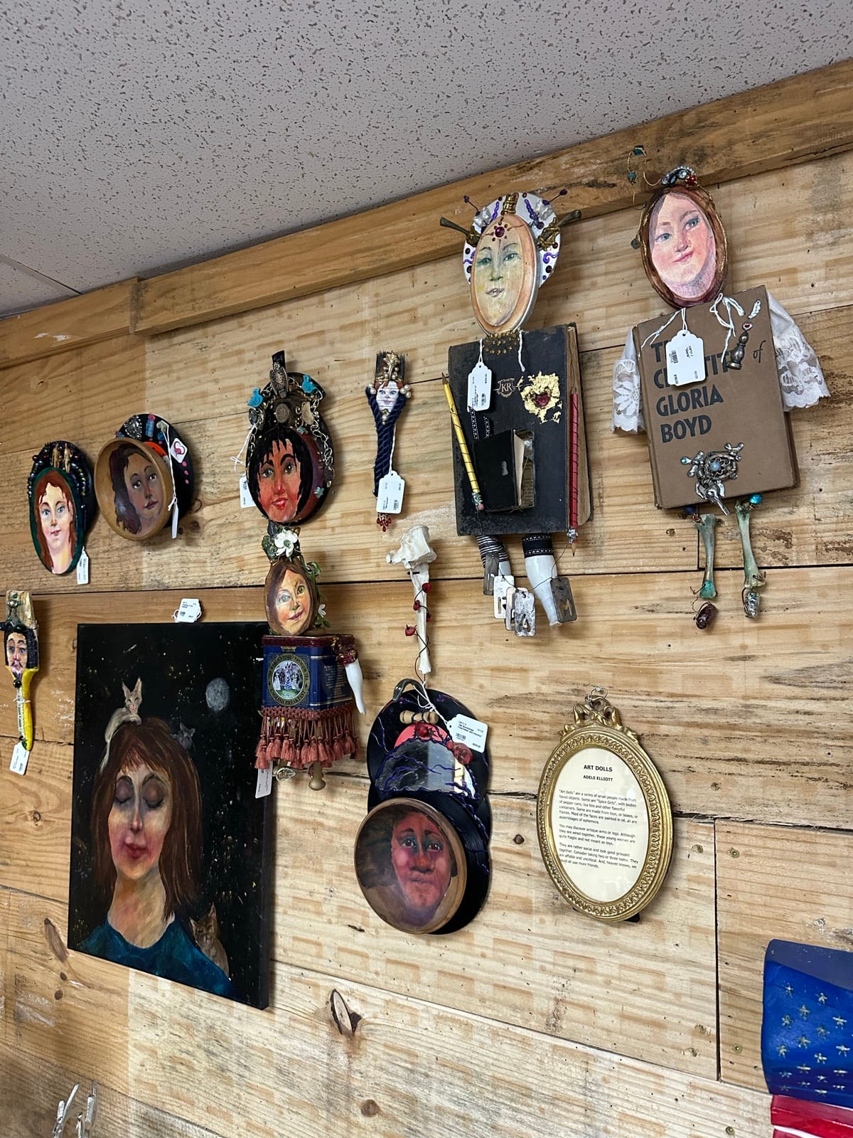 Adele Elliott paintings and mixed-media assemblage art inside Triangle Trading Post