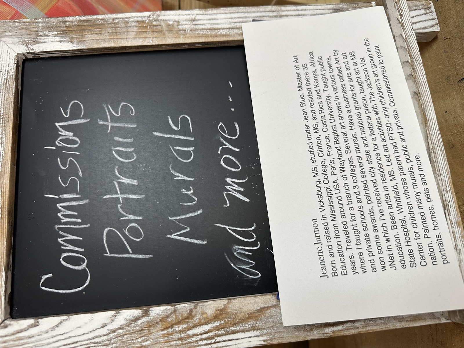 Art by JNet sign offering commissions, portraits, murals, and more