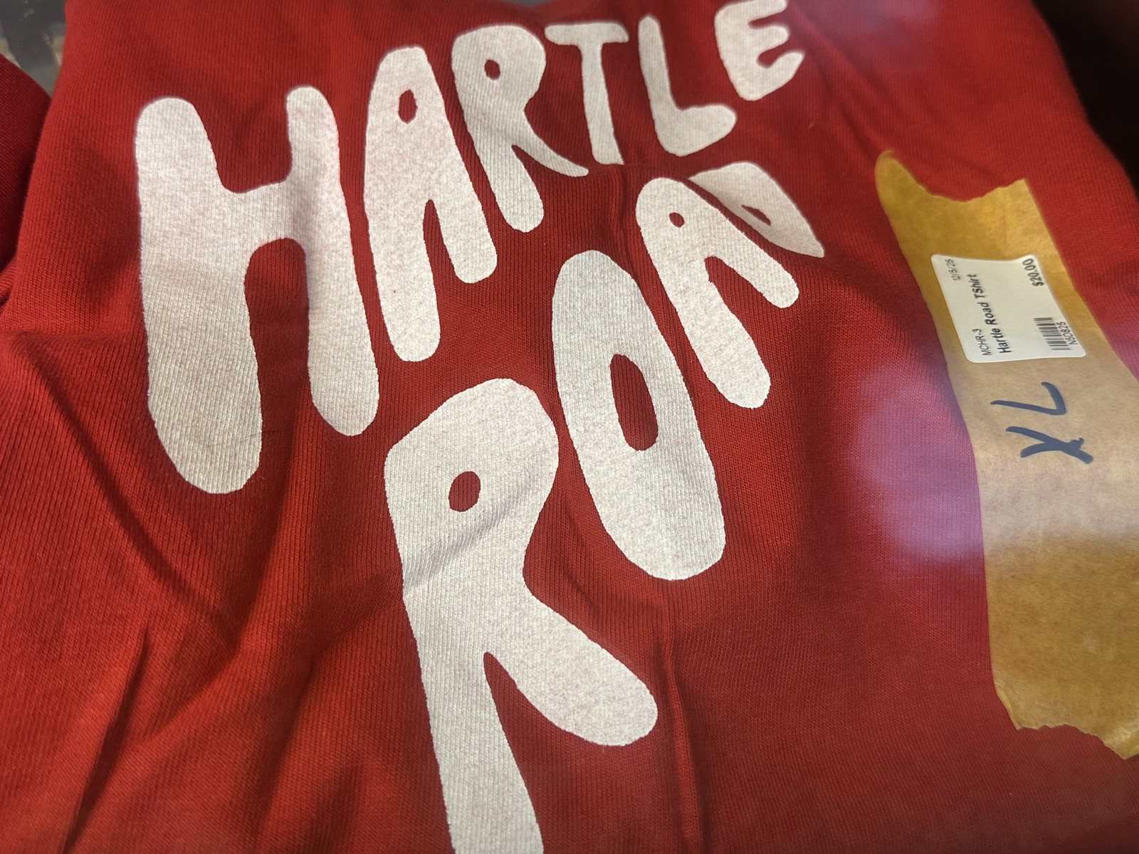 Hartleroad band t-shirt in red with white hand-lettered text