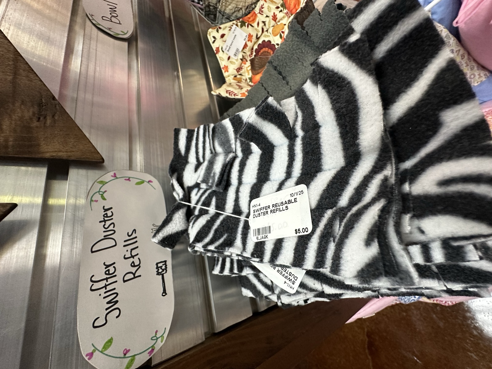 Handmade reusable Swiffer duster refills in assorted fabric patterns