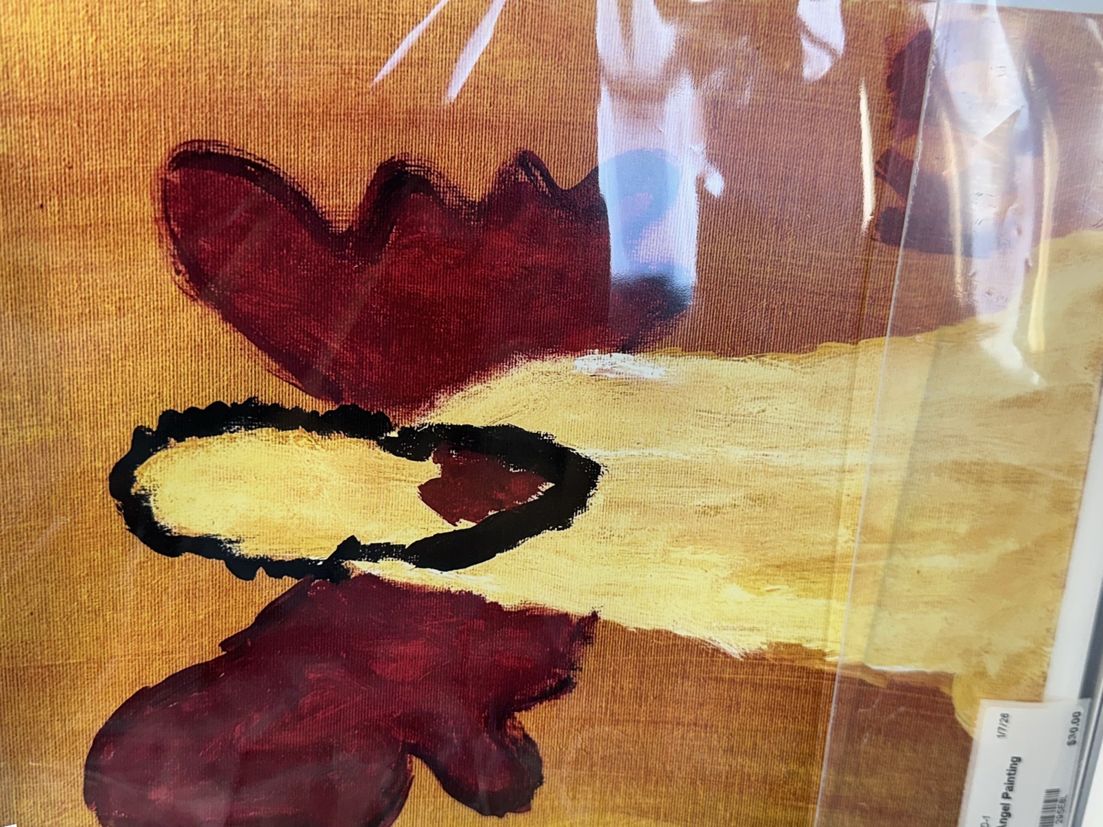 Abstract painting in warm reds, browns, and yellows by Kendrell Daniels