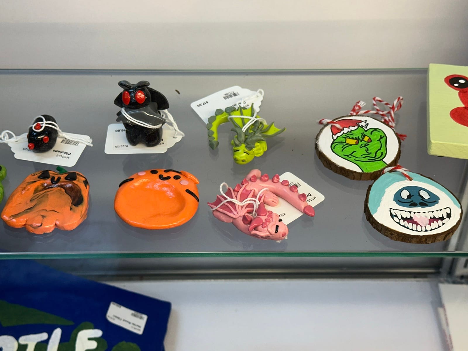 Painted clay ornaments and figurines from More Than Sparrows Co