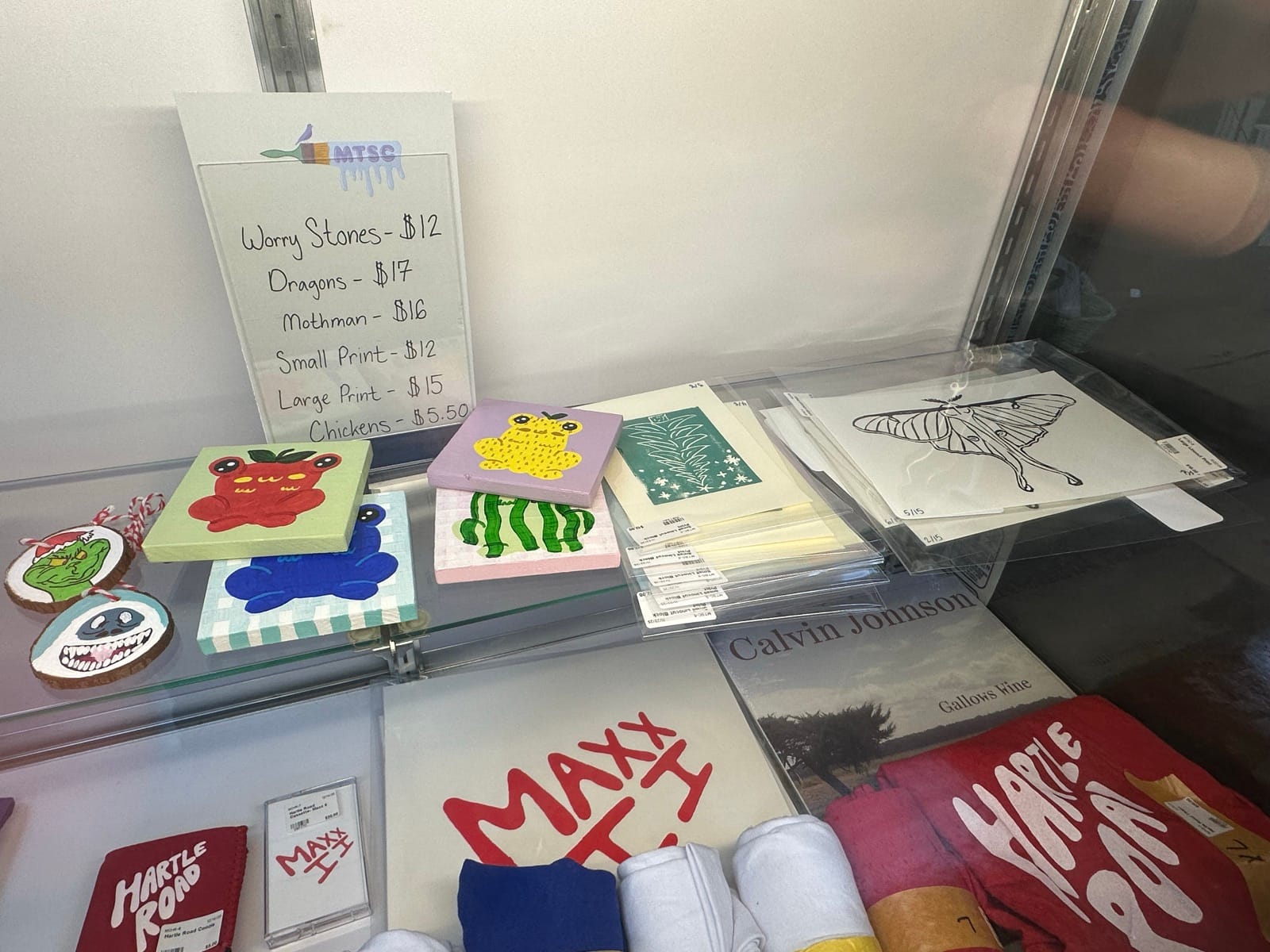 Small art prints, worry stones, and stickers at More Than Sparrows Co