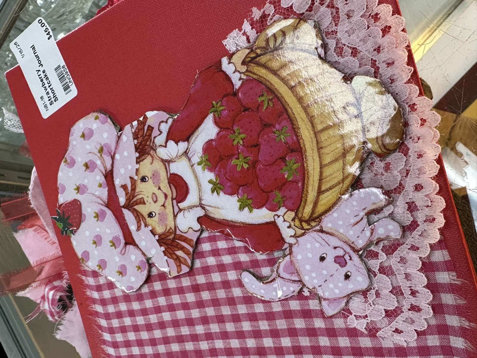 Handmade Strawberry Shortcake themed junk journal with lace trim and gingham fabric