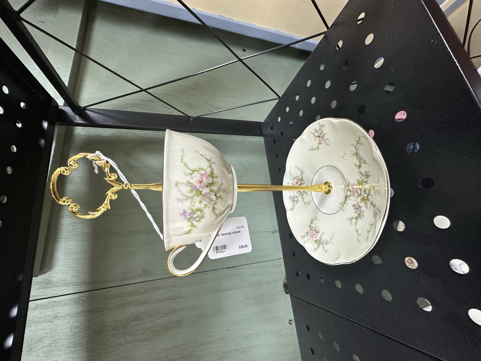 Two-tiered serving stand made from vintage floral teacups and saucers by Simply Craftsy at Triangle Trading Post