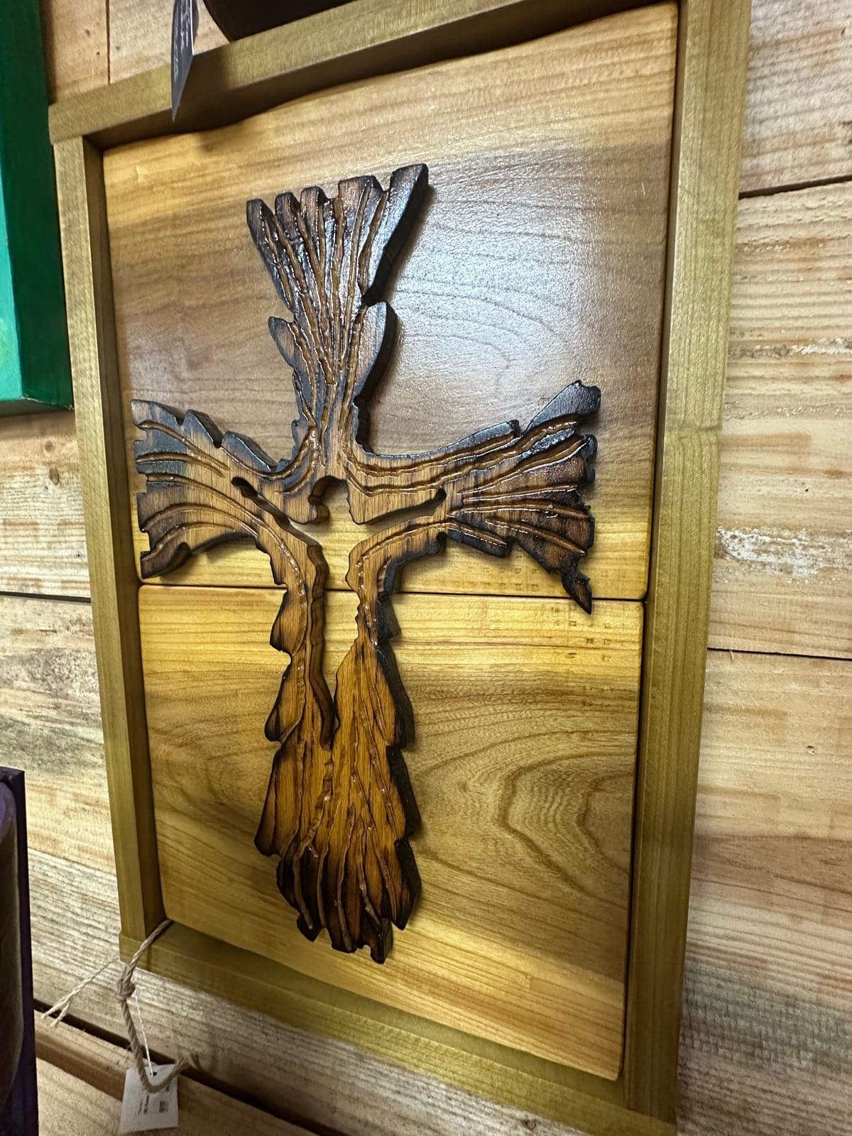 Relief-carved wooden eagle wall panel by Chris McGinnis